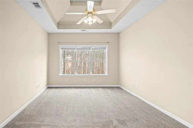 a bathroom with a tub and shower