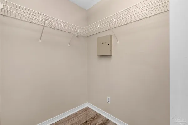 a view of a room with racks on the wall