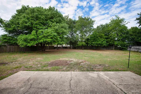 a view of a lake with a yard