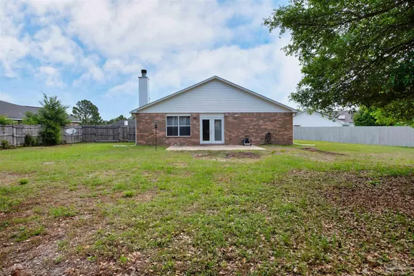 a house view with a garden space