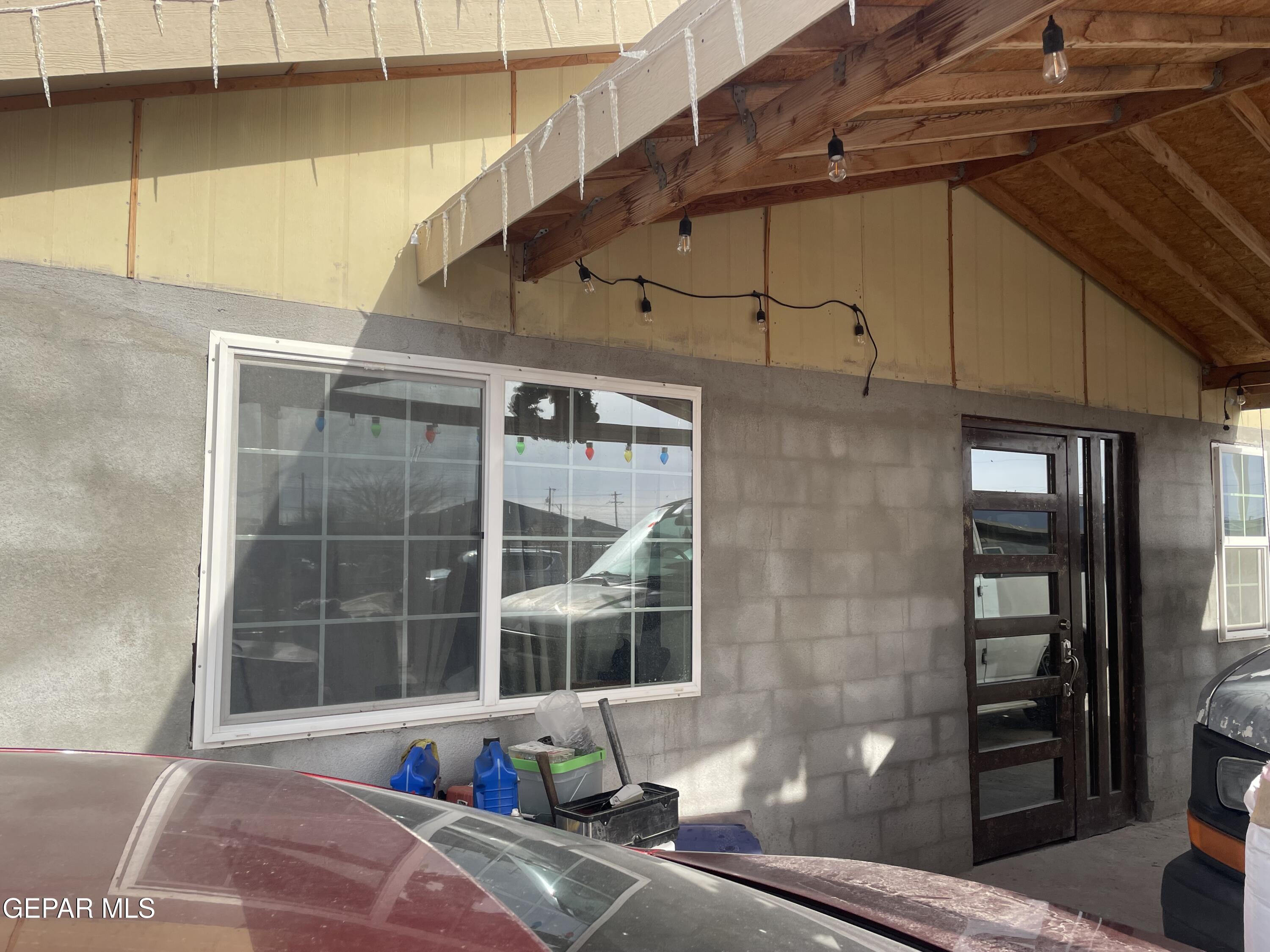 966 Traymore Road El Paso, TX 79928 - Photo 5 of 27 a view of a house with a large window