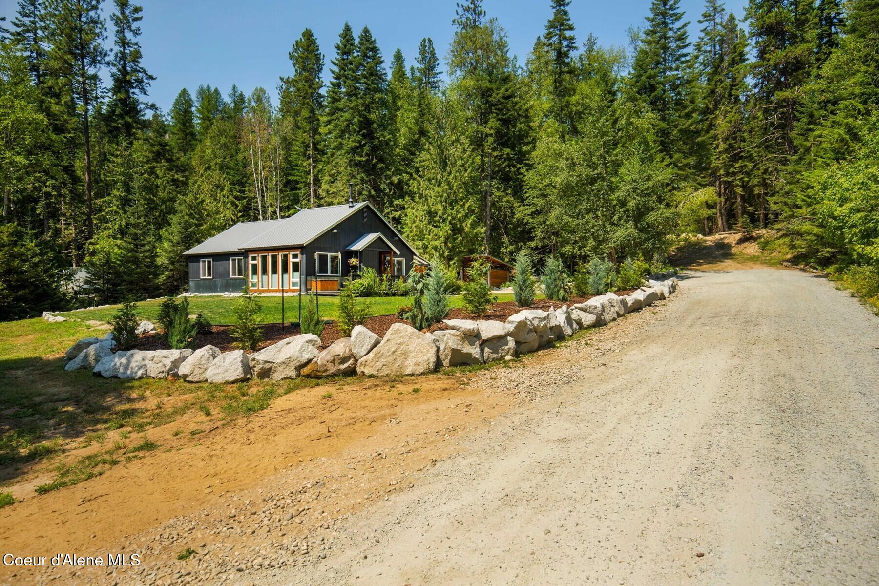 1042 North Wrenco Road Sandpoint, ID 83864 - Photo 20 of 41 Landscaped EntryDriveway