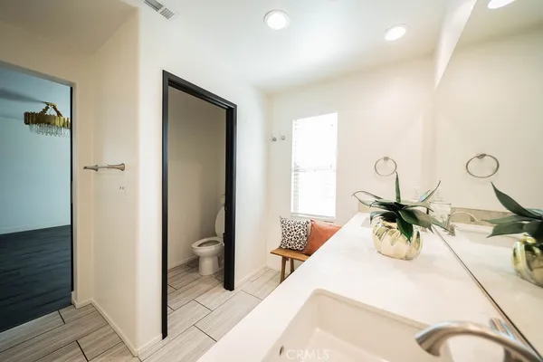 a bathroom with a bathtub and a sink