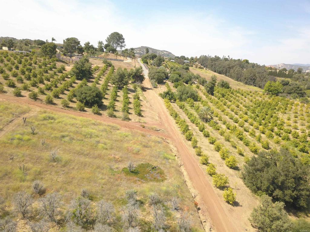 9153 West Lilac Road Escondido, CA 92026 - Photo 2 of 6 a view of a field with mountains in the background