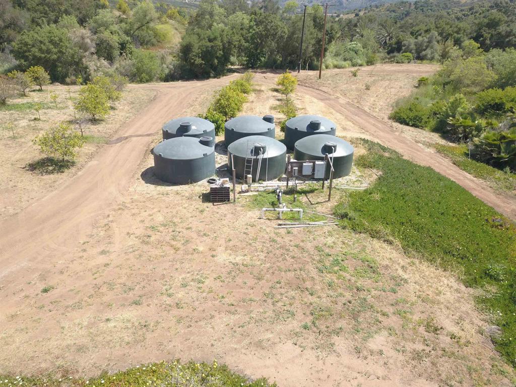 9153 West Lilac Road Escondido, CA 92026 - Photo 5 of 6 a view of a backyard of the house