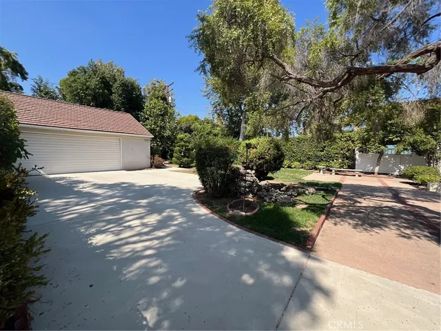 a view of a street with some trees