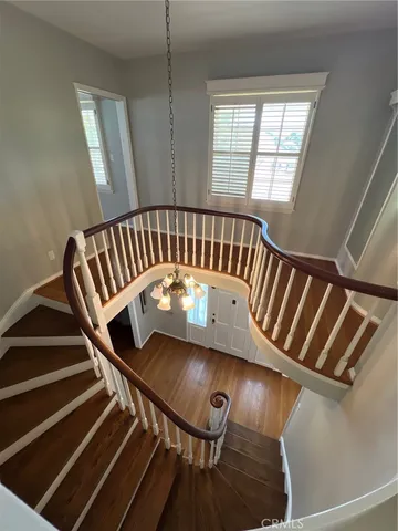 a view of staircase with lots of furniture