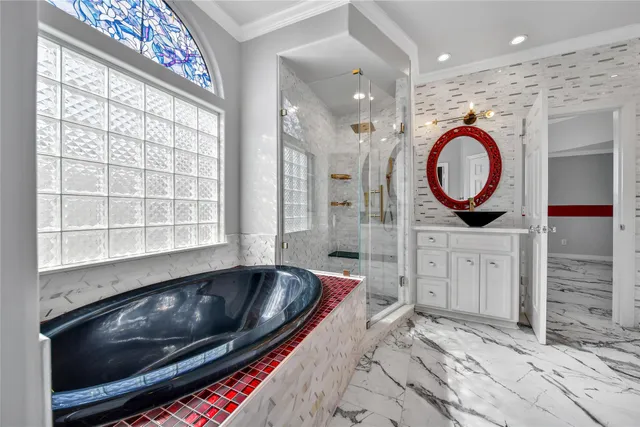 a living room with granite countertop a couch and a stove