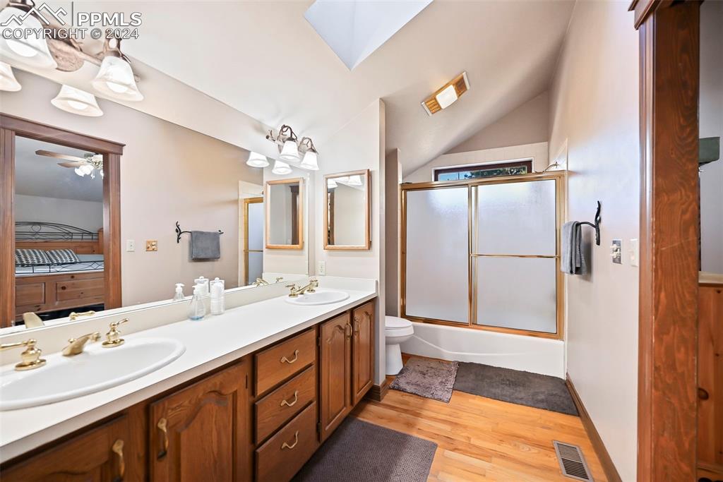 14560 Spiritwood Loop Elbert, CO 80106 - Photo 32 of 44 a spacious bathroom with a double vanity sink mirror and double