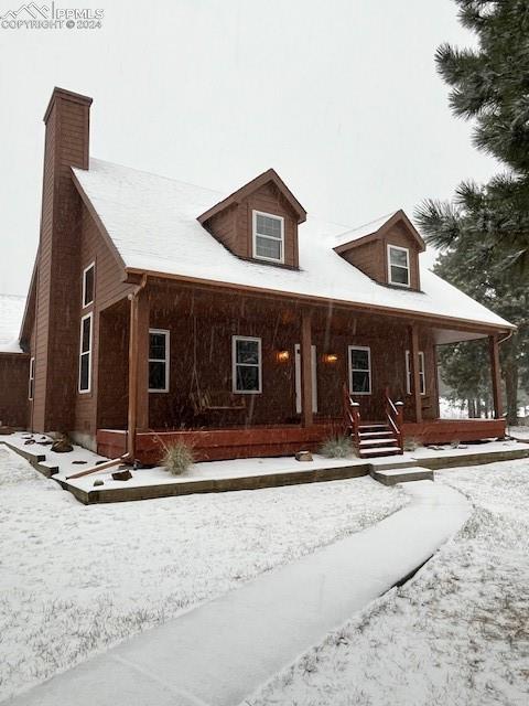 14560 Spiritwood Loop Elbert, CO 80106 - Photo 9 of 44 a front view of house with yard