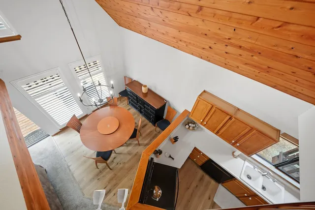 a view of an entryway with wooden floor