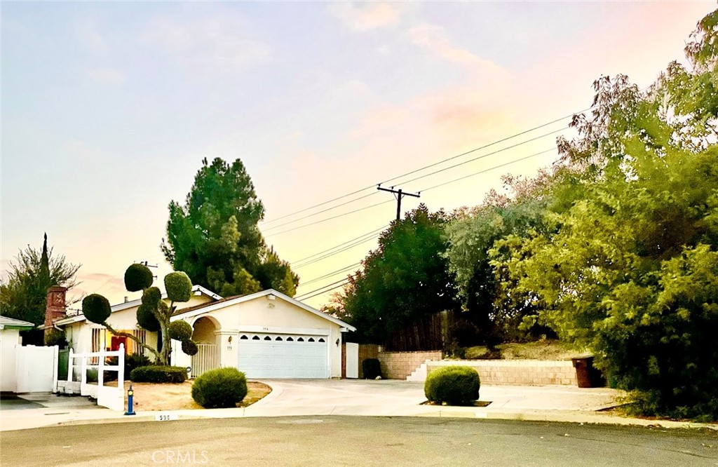 596 Vista Rambla Walnut, CA 91789 - Photo 1 of 1 a view of white house with a big yard and large trees