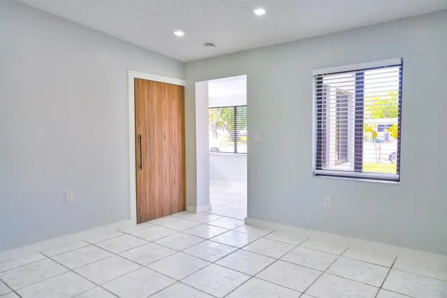 a view of an empty room and window