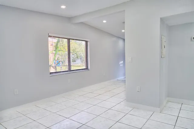 a view of an empty room with window