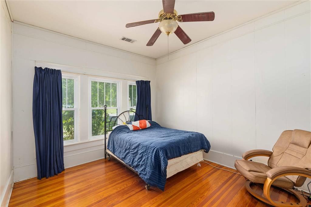 701 4th Street Goldthwaite, TX 76844 - Photo 18 of 32 a bedroom with a bed and window