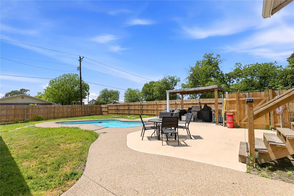 701 4th Street Goldthwaite, TX 76844 - Photo 2 of 32 a view of a backyard with sitting area