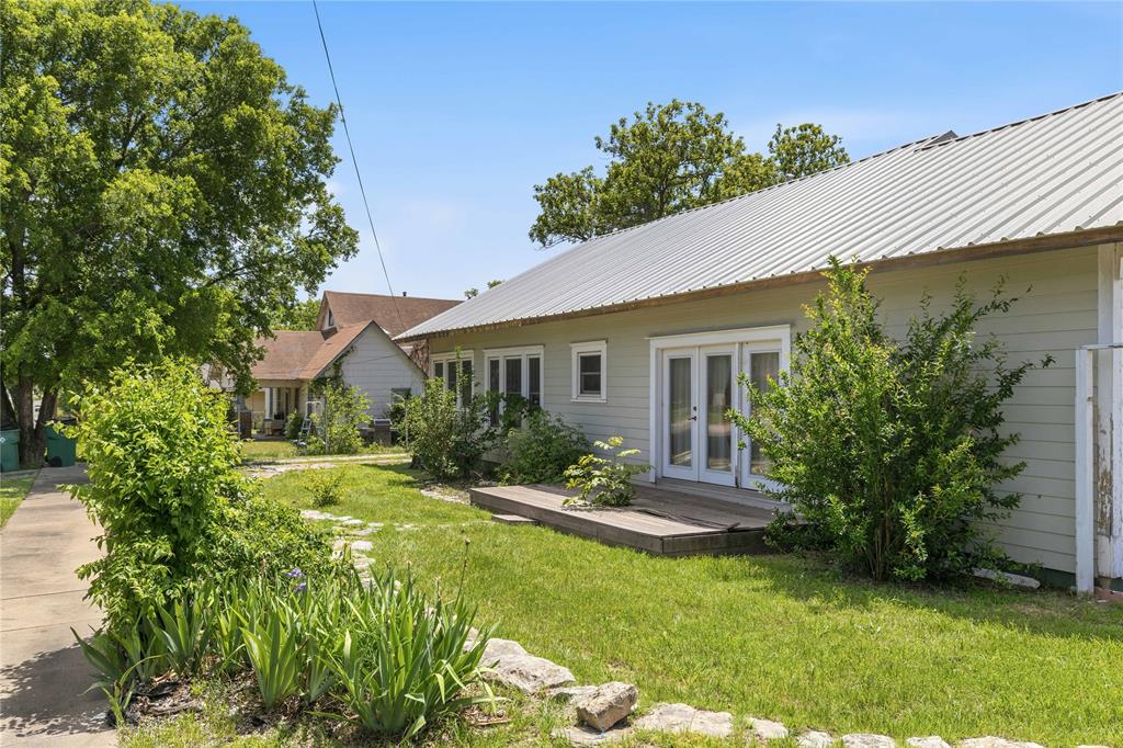 701 4th Street Goldthwaite, TX 76844 - Photo 29 of 32 a front view of a house with a yard