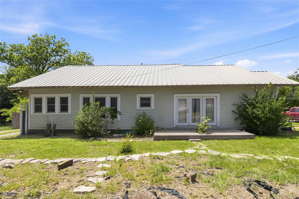 701 4th Street Goldthwaite, TX 76844 - Photo 30 of 32 a front view of a house with garden
