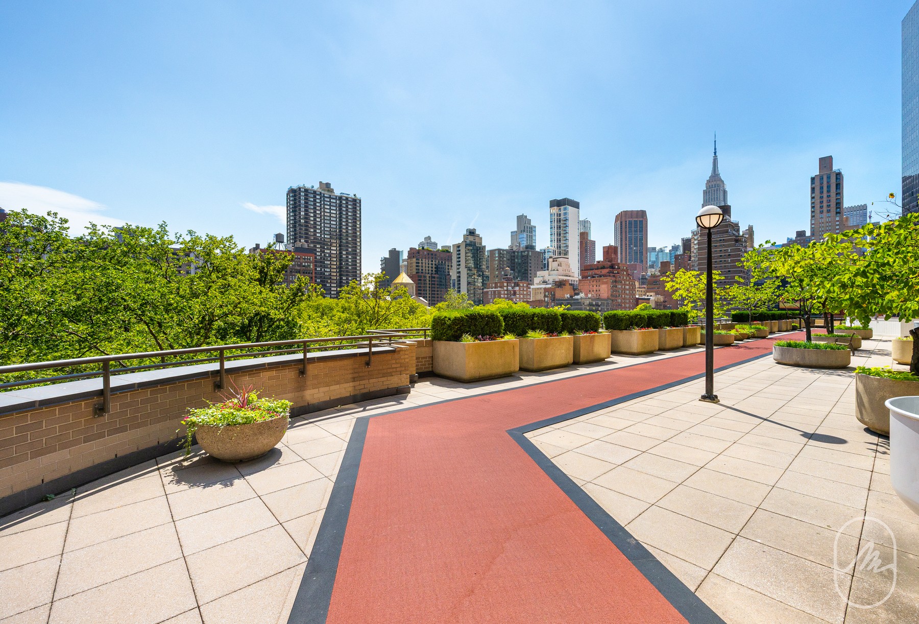 330 East 38th Street, Unit 23Q Manhattan, NY 10016 - Photo 14 of 30 a view of a terrace with chairs