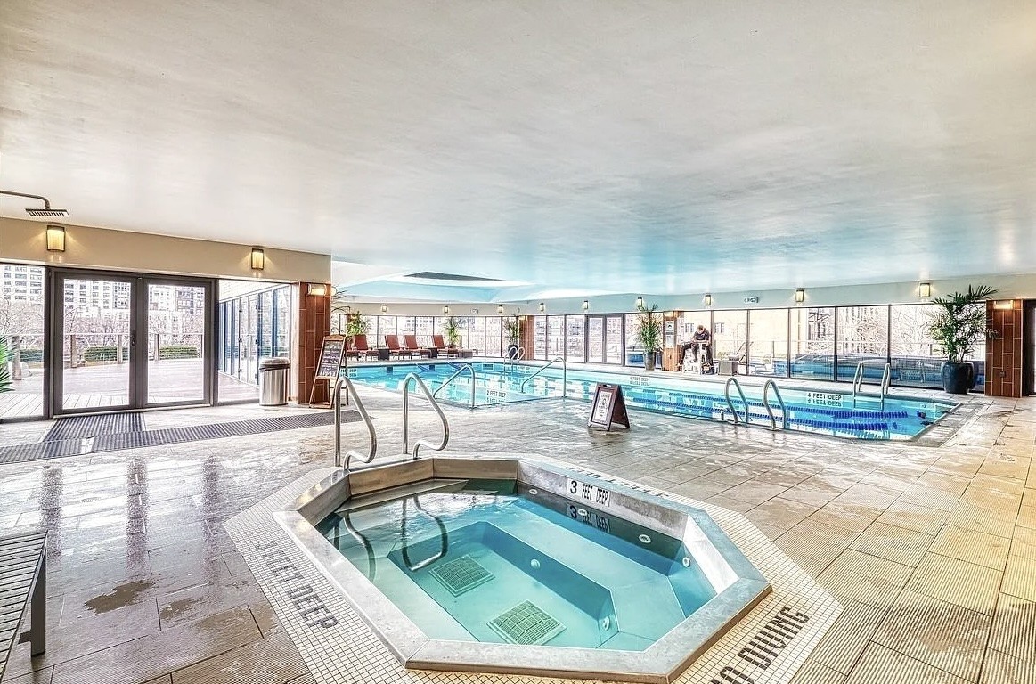 330 East 38th Street, Unit 23Q Manhattan, NY 10016 - Photo 15 of 30 a view of swimming pool with outdoor seating