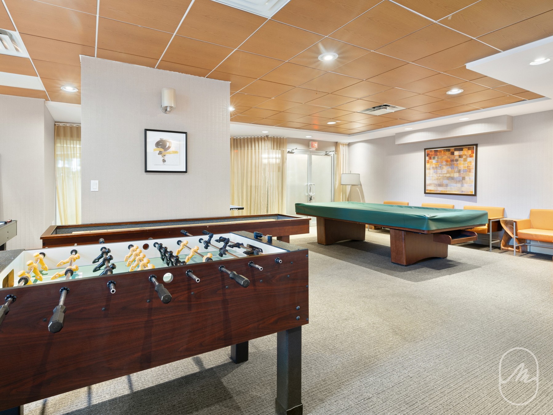 330 East 38th Street, Unit 23Q Manhattan, NY 10016 - Photo 17 of 30 a living room with furniture pool table and window