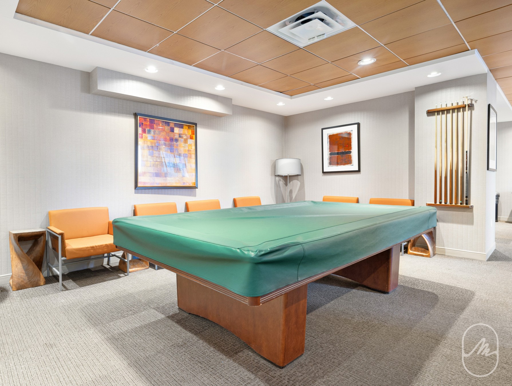 330 East 38th Street, Unit 23Q Manhattan, NY 10016 - Photo 18 of 30 a room with pool table and two couches chair