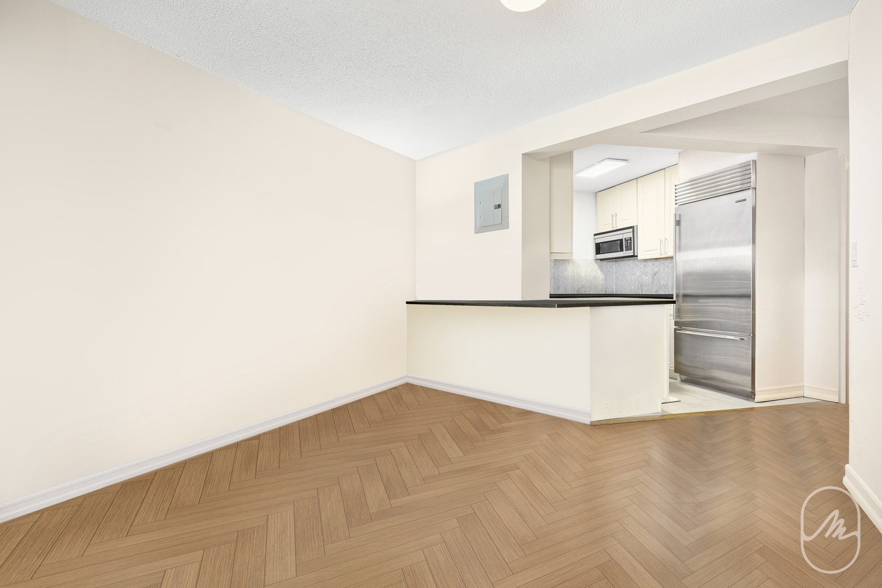 330 East 38th Street, Unit 23Q Manhattan, NY 10016 - Photo 7 of 30 a view of a kitchen with wooden floor