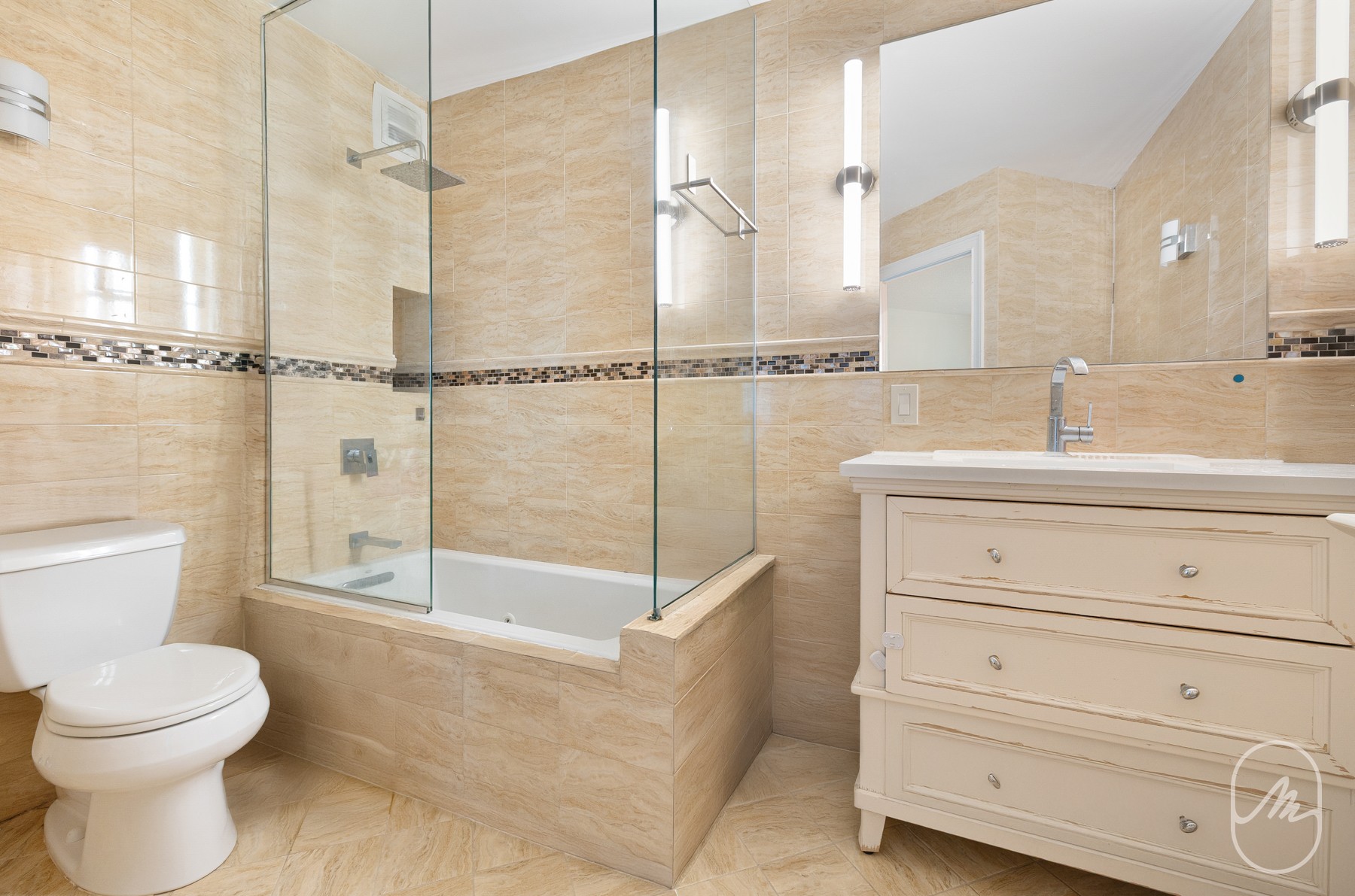 330 East 38th Street, Unit 23Q Manhattan, NY 10016 - Photo 9 of 30 a bathroom with a sink a toilet and shower