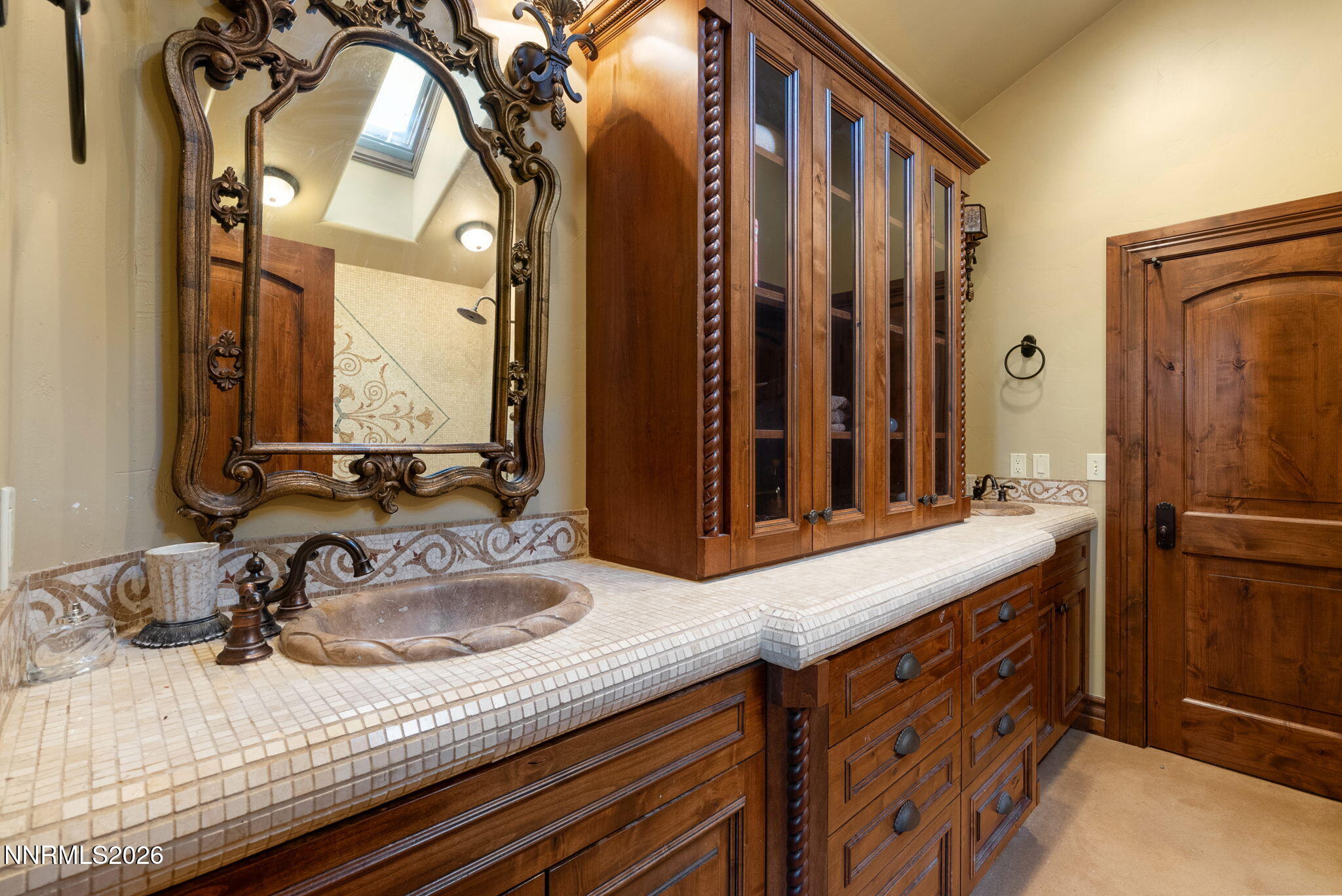 123 Andrew Lane Reno, NV 89521 - Photo 31 of 50 a bathroom with a double vanity sink and a mirror