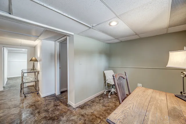 a view of a room with table and chair