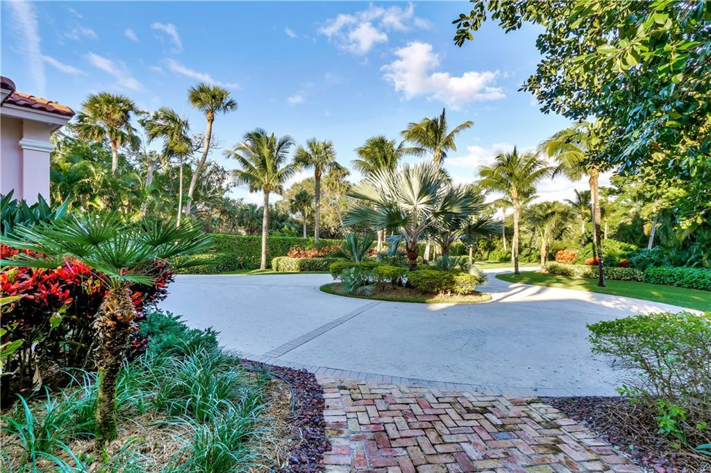 171 South River Road Stuart, FL 34996 - Photo 15 of 68 a view of a garden with a fountain