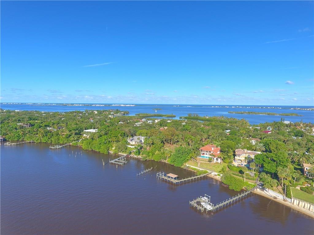 171 South River Road Stuart, FL 34996 - Photo 29 of 68 a view of a lake with houses