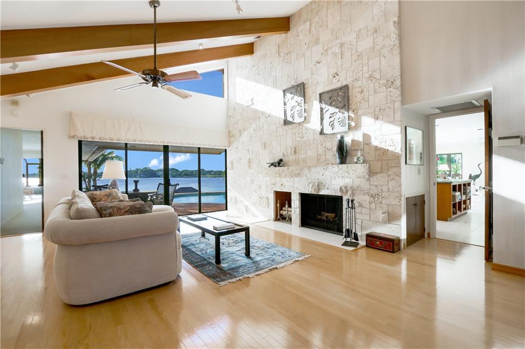 171 South River Road Stuart, FL 34996 - Photo 40 of 68 a living room with fireplace furniture and a fireplace