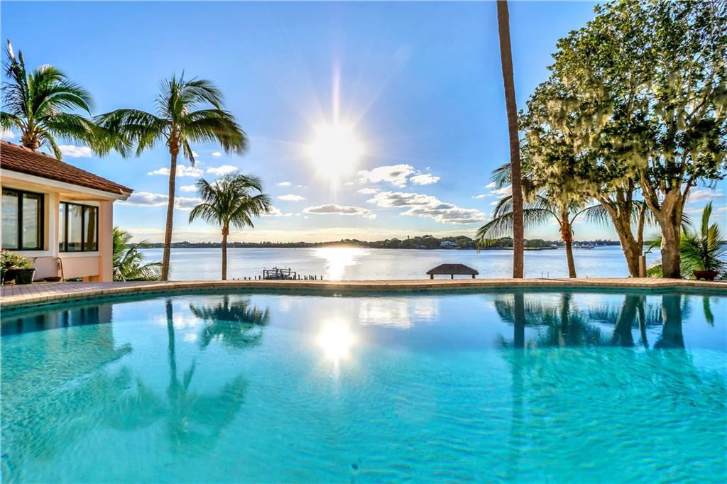 171 South River Road Stuart, FL 34996 - Photo 5 of 68 a view of swimming pool with outdoor seating