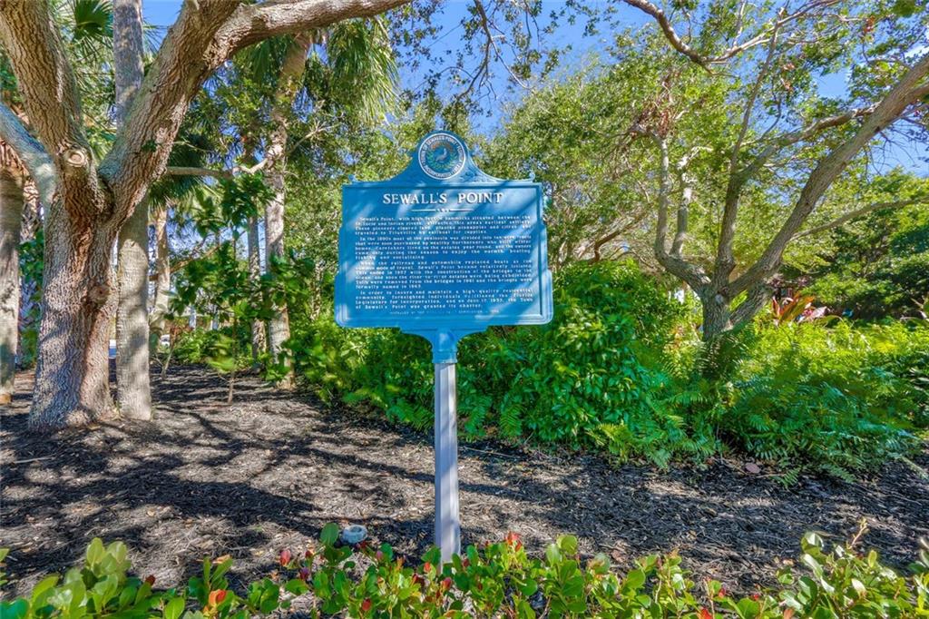 171 South River Road Stuart, FL 34996 - Photo 58 of 68 a wooden fence with a tree