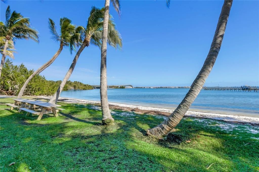 171 South River Road Stuart, FL 34996 - Photo 65 of 68 a view of a park with a slide