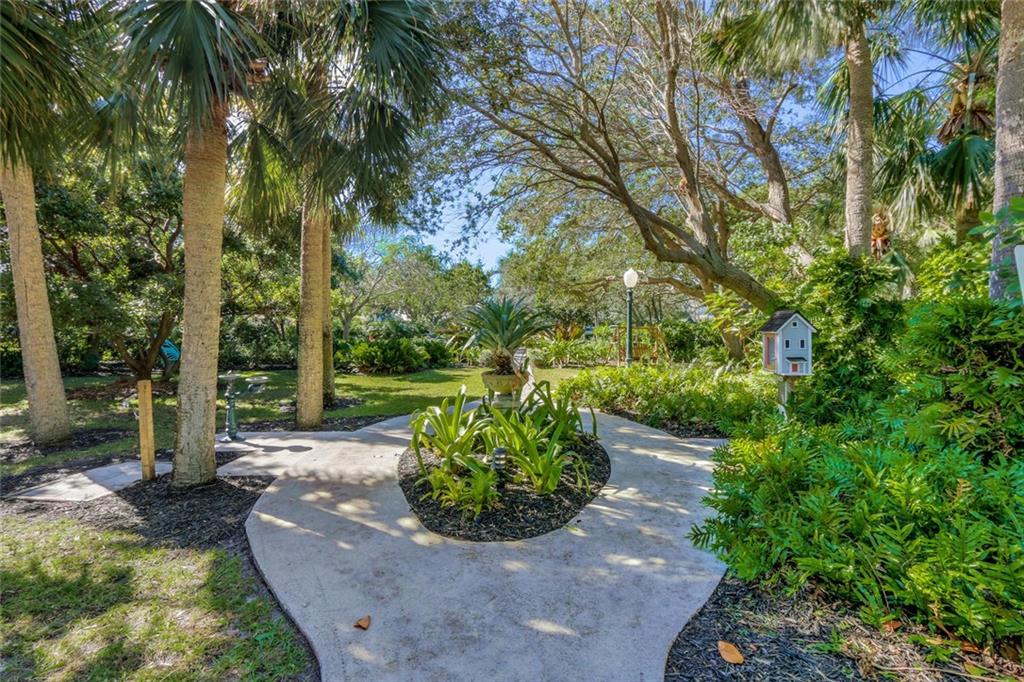 171 South River Road Stuart, FL 34996 - Photo 66 of 68 a view of a garden with a tree