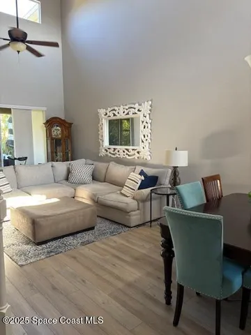 a sink with white cabinets