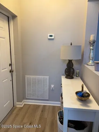 a view of workspace with wooden floor