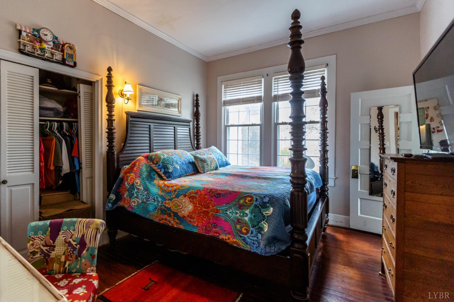 801 Purdum Mill Road Appomattox, VA 24522 - Photo 14 of 68 a bedroom with a bed and wooden floor