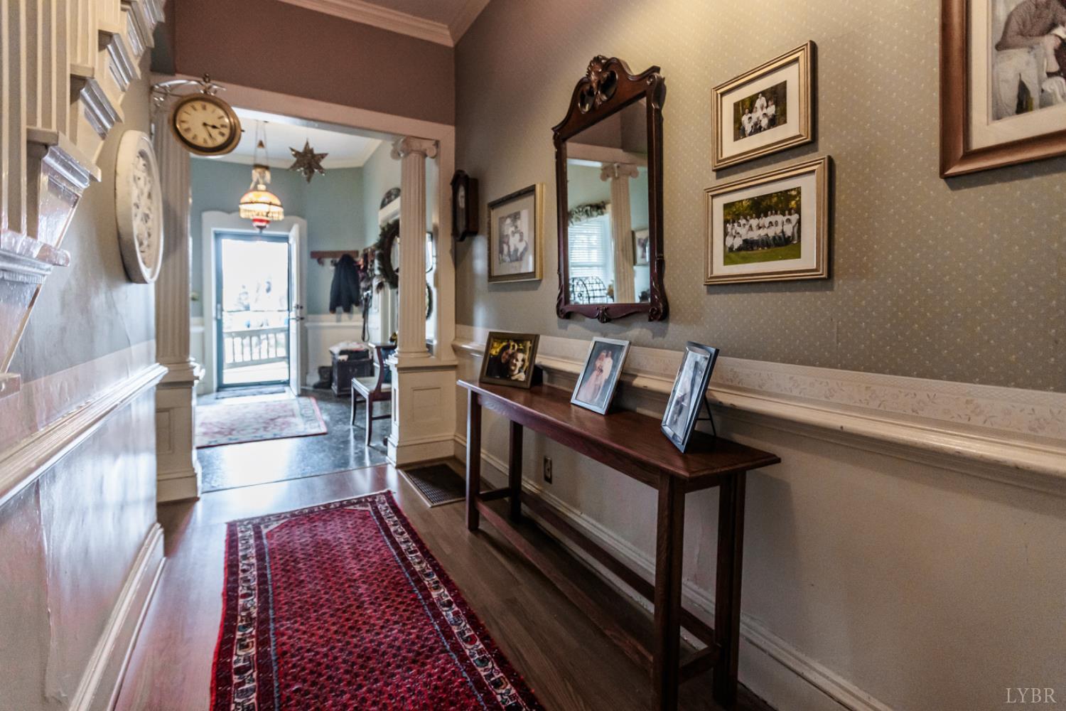 801 Purdum Mill Road Appomattox, VA 24522 - Photo 34 of 68 a view of a hallway with wooden floor and furniture