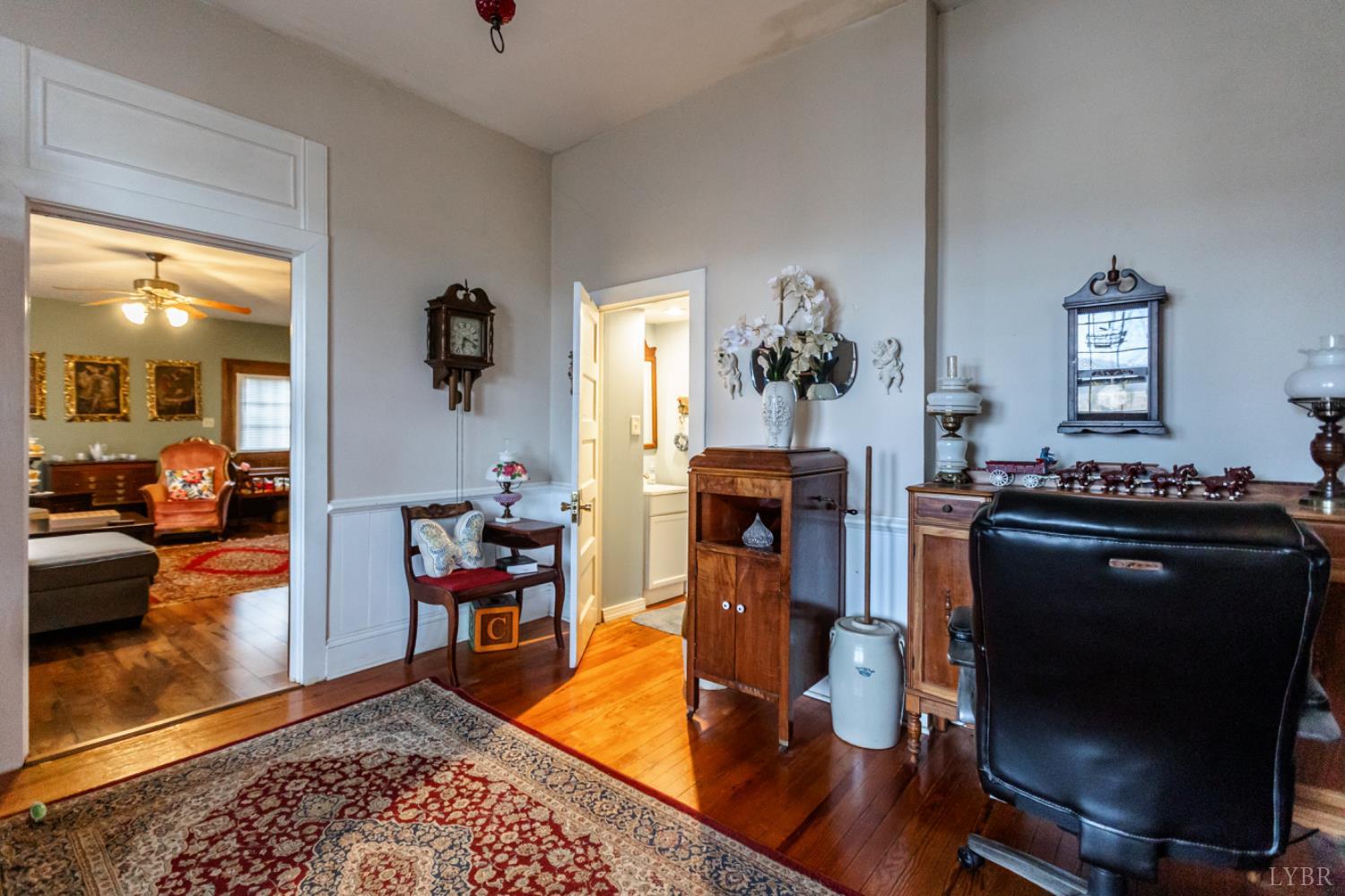 801 Purdum Mill Road Appomattox, VA 24522 - Photo 39 of 68 a living room with furniture and wooden floor