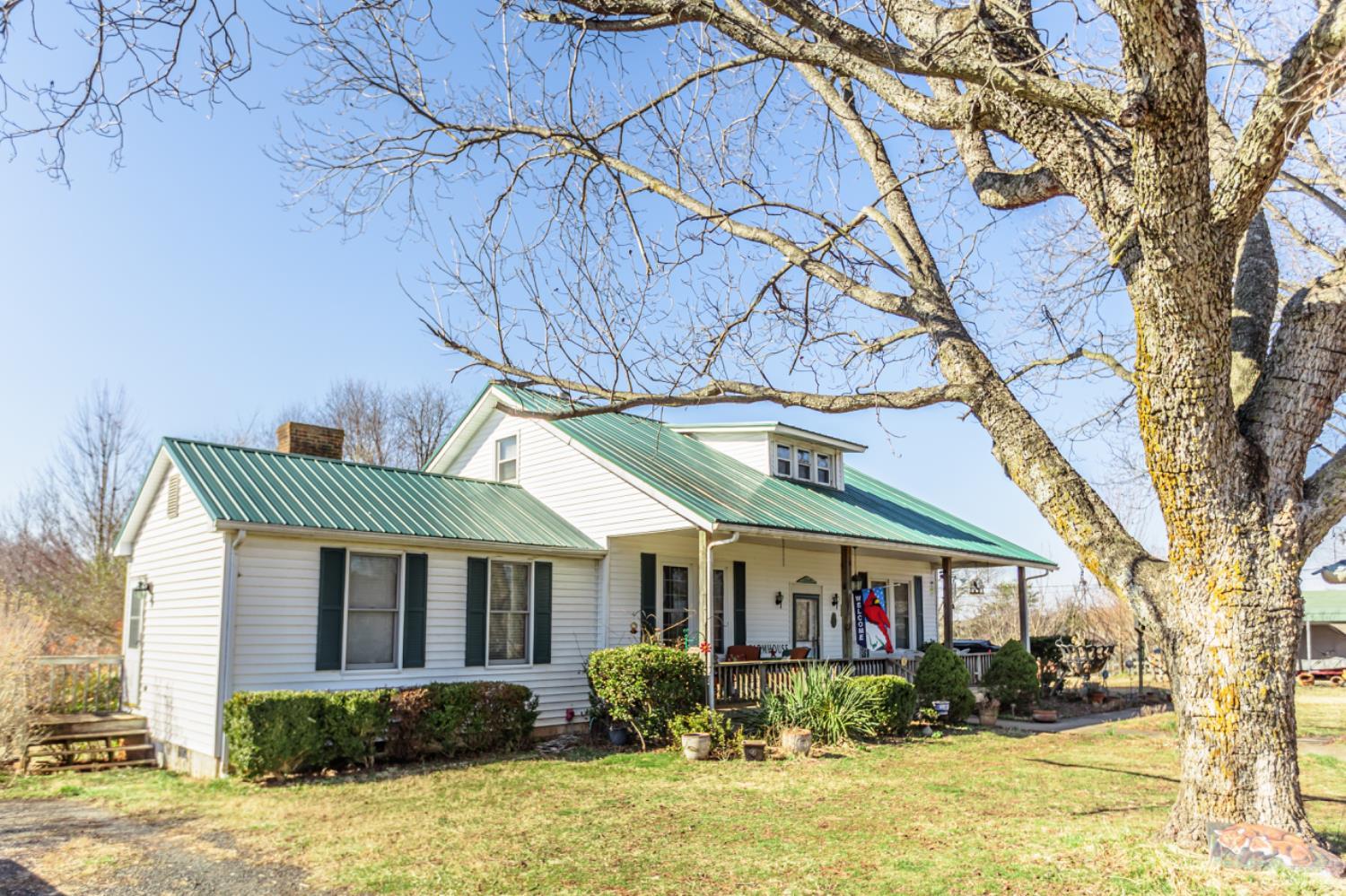 801 Purdum Mill Road Appomattox, VA 24522 - Photo 4 of 68 a front view of house with yard and trees around