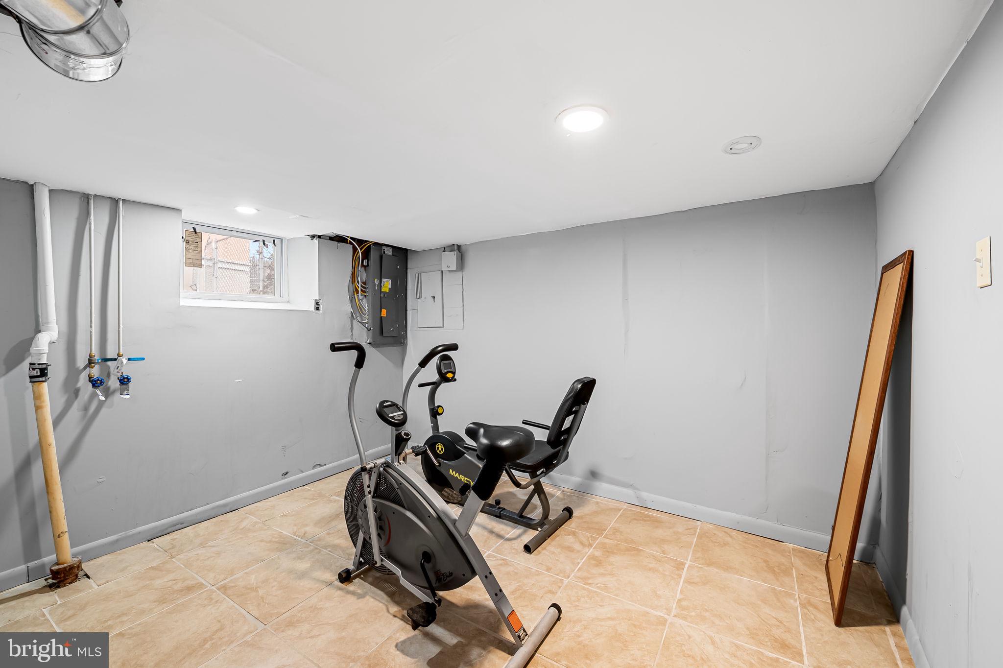 2908 East Cold Spring Lane Baltimore, MD 21214 - Photo 12 of 19 a view of a room with gym equipment