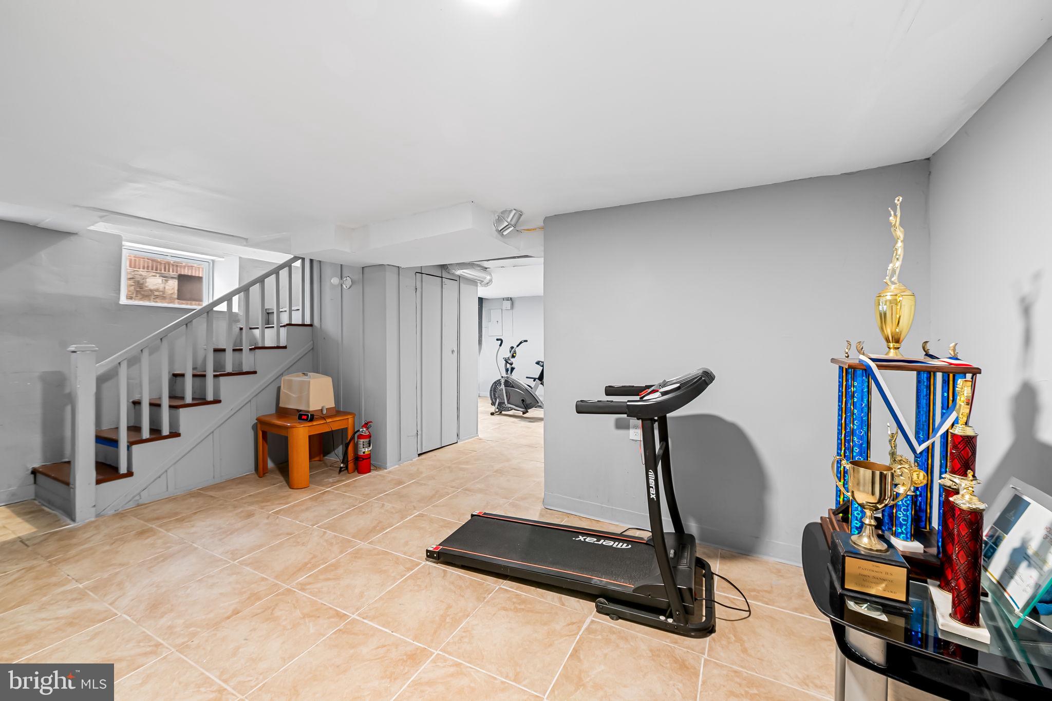 2908 East Cold Spring Lane Baltimore, MD 21214 - Photo 14 of 19 a view of a room with gym equipment