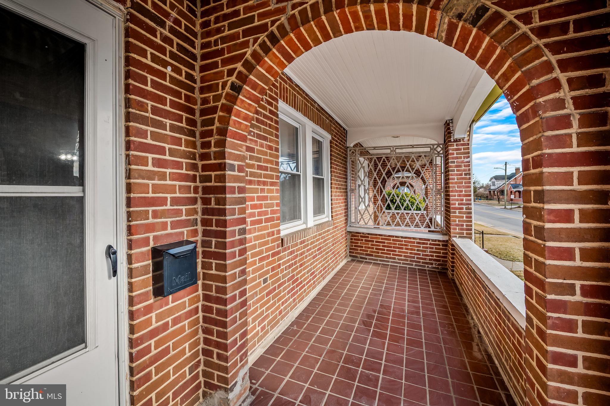 2908 East Cold Spring Lane Baltimore, MD 21214 - Photo 2 of 19 a view of a balcony with door