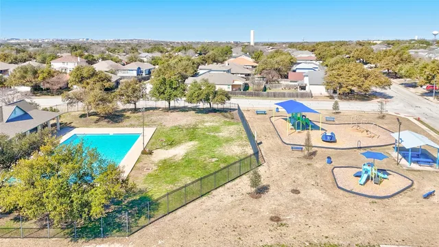 view of living room with furniture and flowers