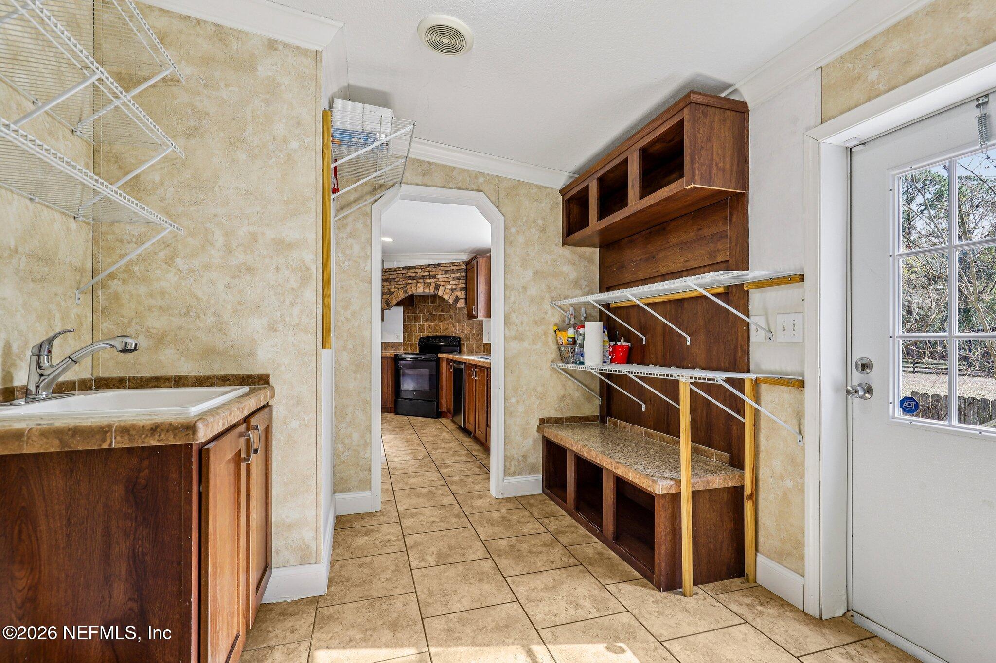 13725 Webb Road Jacksonville, FL 32218 - Photo 21 of 61 a utility room with dryer and washer