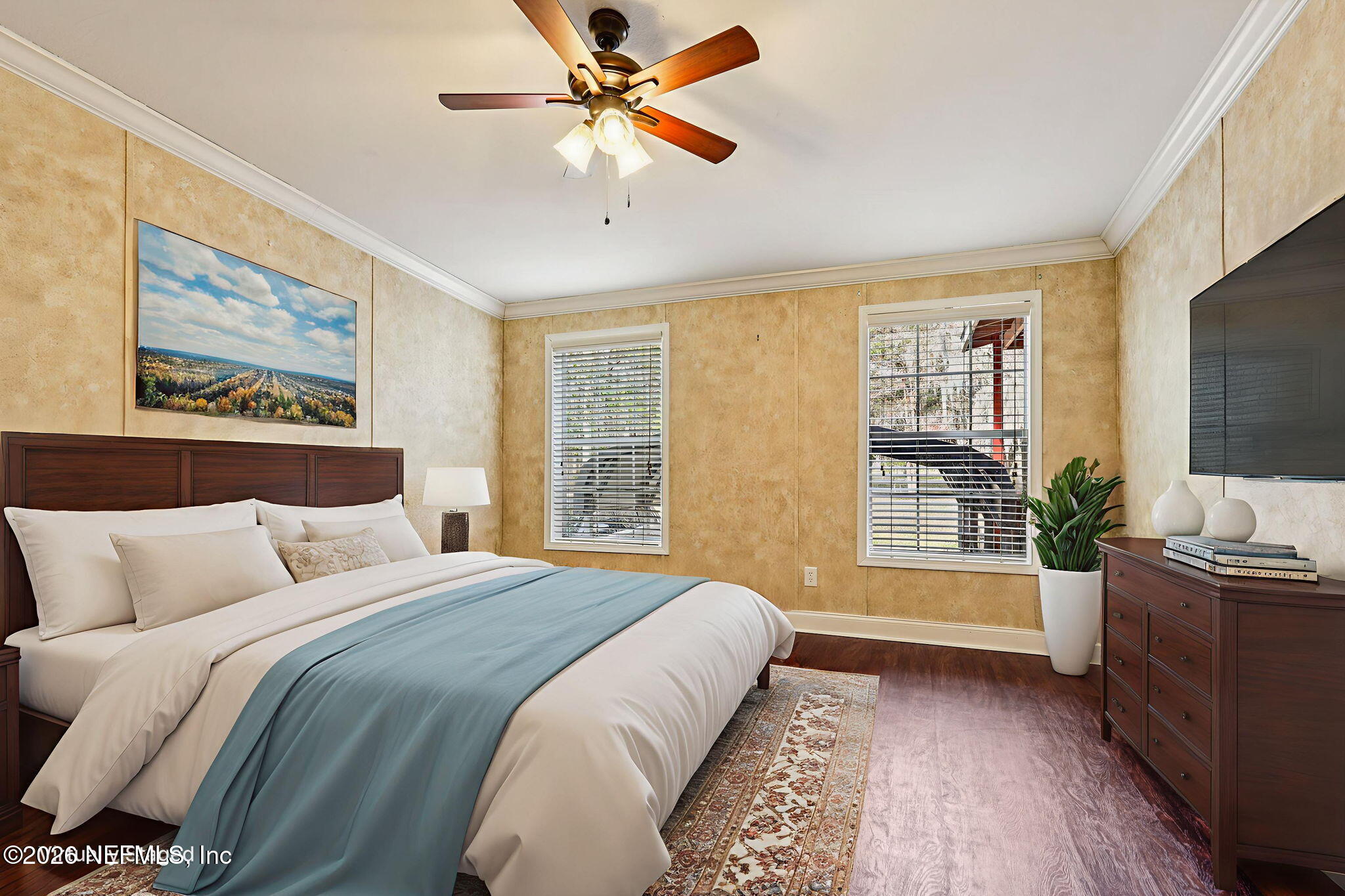 13725 Webb Road Jacksonville, FL 32218 - Photo 22 of 61 a bedroom with a large bed and a flat tv screen on dresser