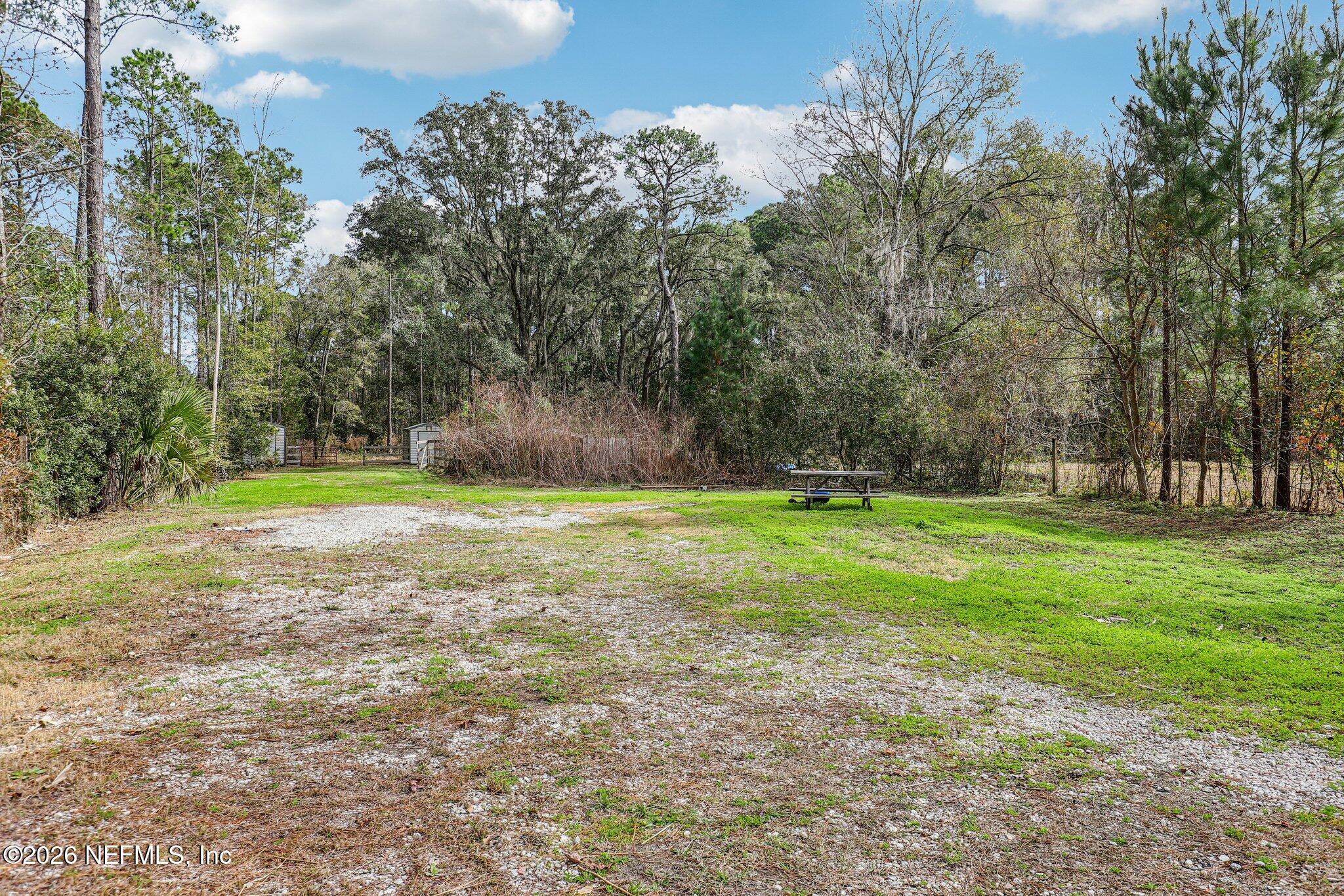 13725 Webb Road Jacksonville, FL 32218 - Photo 42 of 61 a view of outdoor space with yard